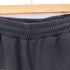 アンノウン UNKNOWN スパンコール クロス スウェットパンツ メンズ import:M