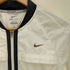 ナイキ NIKE ウィンドブレーカージップアップジャケット レディース JPN:L