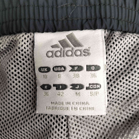 アディダス adidas ロゴ刺繍 サイドジップ ナイロンパンツ メンズ JPN:M