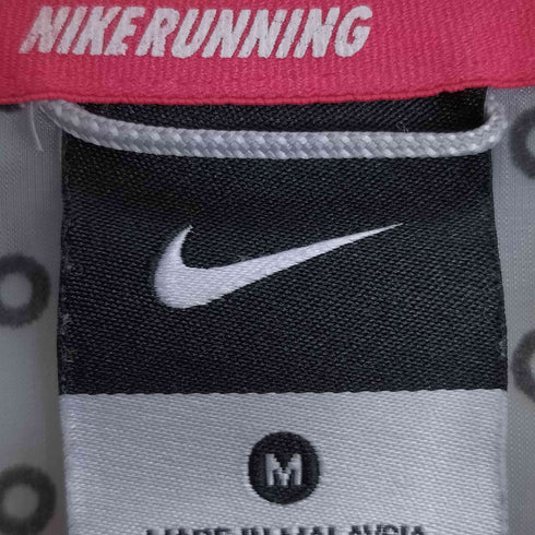 ナイキ NIKE RUNNING 総柄 ナイロンパーカー レディース import:M