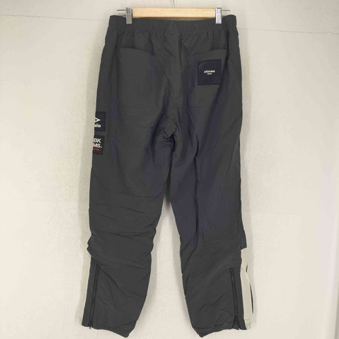 アンブロ UMBRO トリプルコラボデザイン ワッペンロゴ テックパンツ メンズ JPN:M