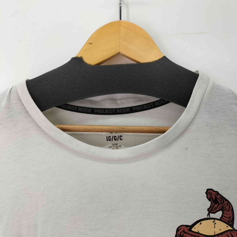 アンダーアーマー UNDER ARMOUR PROJECT ROCK スカルプリント クルーネック Tシャツ メンズ JPN:L