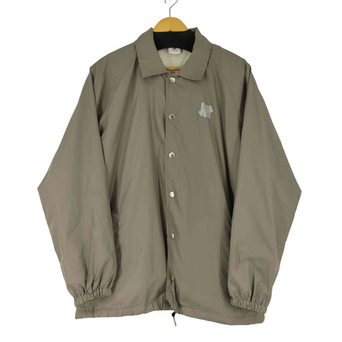 アンディフィーテッド UNDEFEATED ロゴプリント ナイロンコーチジャケット メンズ JPN:M