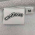 cautious ロゴプリントプルオーバーパーカー メンズ JPN:M