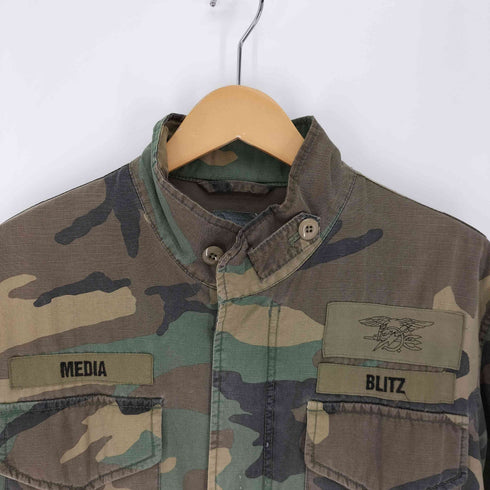 ダブルタップス WTAPS M65型 刺繍 MEDIA BLITZ パッチ 裾ドローコード リップストップ カモ柄 ミリタリージャケット メンズ