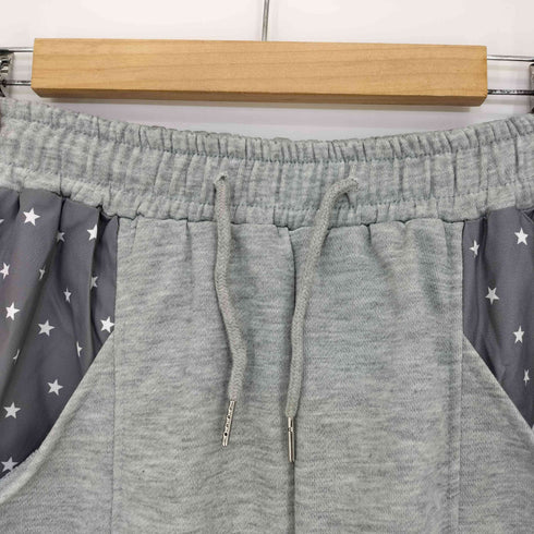 NUGU スターストリングスウェットパンツ レディース