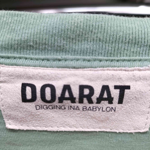 ドゥアラット DOARAT 両面ロゴプリント S/S Tシャツ メンズ