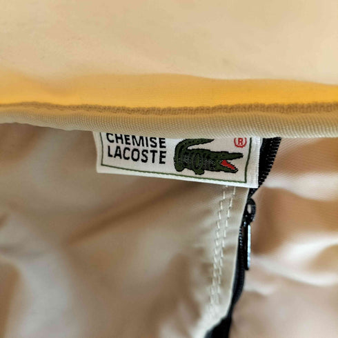 ラコステ LACOSTE 型押しサークルトートバッグ レディース