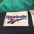 リーボック Reebok ロゴ刺繍ナイロンジャケット メンズ L