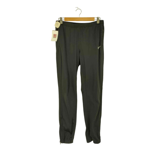 ナイキ NIKE DRI-FIT 裾ジップ トラックパンツ レディース import:M