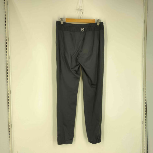 ナイキ NIKE DRI-FIT 裾ジップ トラックパンツ レディース import:M