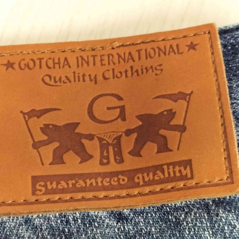 GOTCHA SURF アイコン スタッズ ロゴ刺繍 背面 プリント ダメージ加工 ローライズ デニム パンツ Y2K メンズ JPN:L