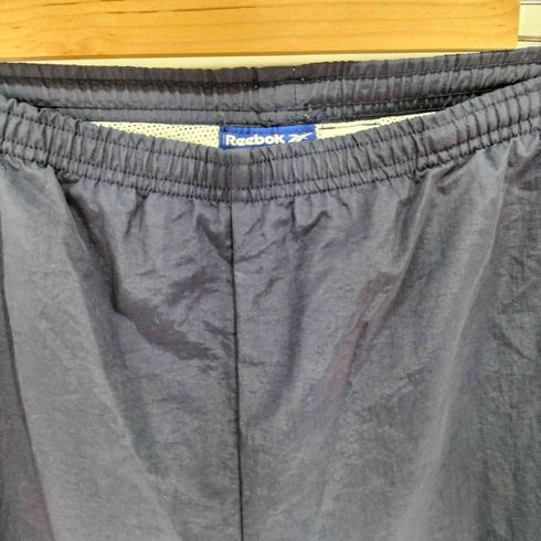 リーボック Reebok 裏地メッシュ ナイロンパンツ メンズ JPN:M