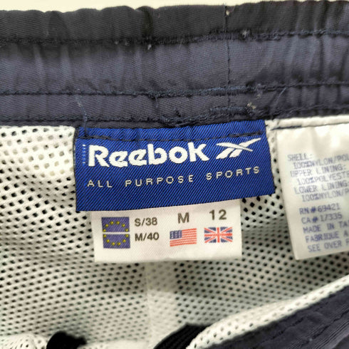 リーボック Reebok 裏地メッシュ ナイロンパンツ メンズ JPN:M