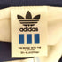 アディダス adidas デサント製 袖トレフォイルロゴプリント スタンドカラー ナイロンジャケット レディース 90-4