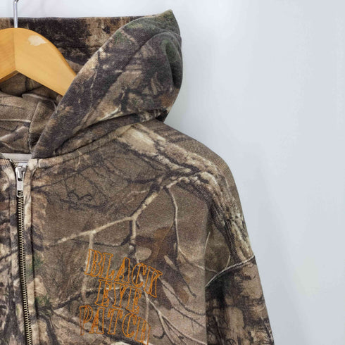 ザブラックアイパッチ THE BLACK EYE PATCH STENCIL LOGO REALTREE THERMAL ZIP HOODIE リアルツリーカモ ジップフーディー メンズ JPN:L