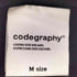 codegraphy Square Logo Short Sleeve T-Shirt CBEUUTS011 メンズ M