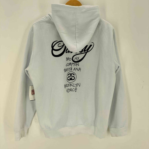 ステューシー Stussy WORLD TOUR 両面プリントプルオーバーパーカー メンズ XL