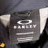 オークリー OAKLEY PERFORMANCE FIT バイカラー リップストップ オーバルロゴ マウンテンジャケット メンズ JPN:L