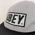 オベイ OBEY つば裏緑 ロゴ6パネルキャップ メンズ ONE SIZE