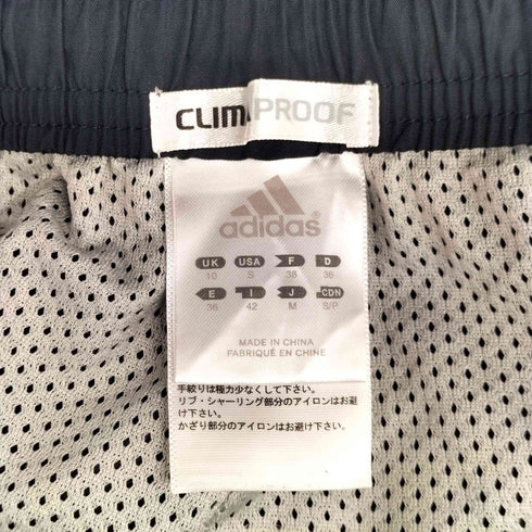 アディダス adidas ウィンドブレーカーパンツ メンズ JPN:M
