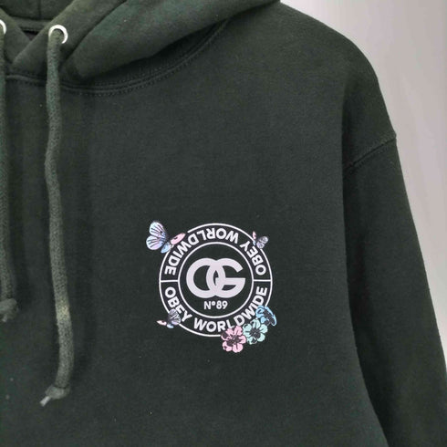 オベイ OBEY ロゴプリント 蝶々 花 プルオーバーパーカー メンズ import:M