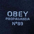 オベイ OBEY ロゴプリント 蝶々 花 プルオーバーパーカー メンズ import:M