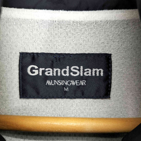 マンシングウェア GRANDSLAM MUNSINGWEAR ロゴプリントナイロンジャケット メンズ M