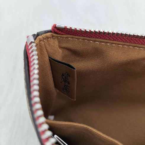 コーチ COACH ジップ リストレット・シグネチャー キャンバス・ワイルド ストロベリー レディース