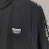 アディダス adidas Reveal Your Voice Taped Jacket メンズ JPN:M
