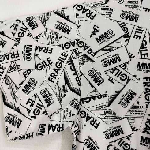エムエムシックスメゾンマルジェラ MM6 Maison Margiela 紙タグ総柄デザインワイドTシャツ レディース 12