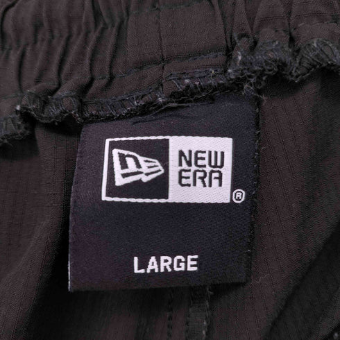 ニューエラ NEW ERA Wordmark ライトウインド ショートパンツ メンズ JPN:L