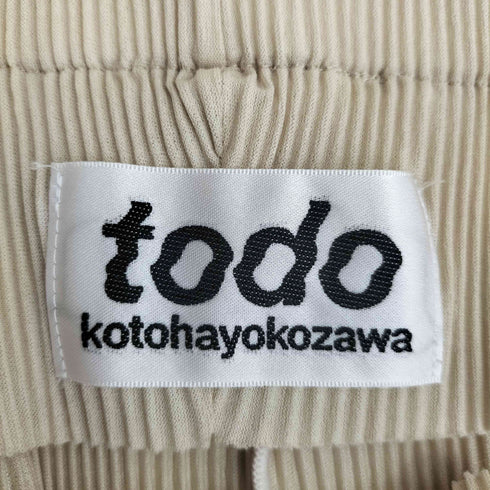 コトハヨコザワ kotohayokozawa ピープホール スリット プリーツパンツ レディース