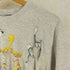 袖裾シングル キャラクタープリント クルーネックTシャツ レディース