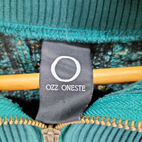 OZZONESTE ダークグリーン ハイネック ダブルジップ ニットケープ レディース