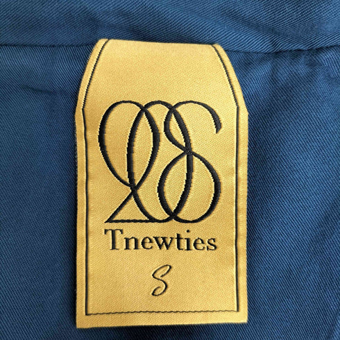 トゥエンティーズ Tnewties 次の取材の準備をして パイピングトレンチコート レディース