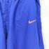 ナイキ NIKE チームロゴ 裾ドローコード ナイロンパンツ レディース JPN:M