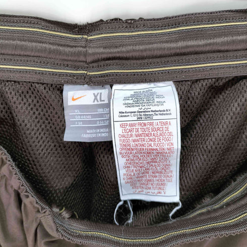 ナイキ NIKE チームロゴ 裾ジップ ナイロンパンツ メンズ JPN:XL