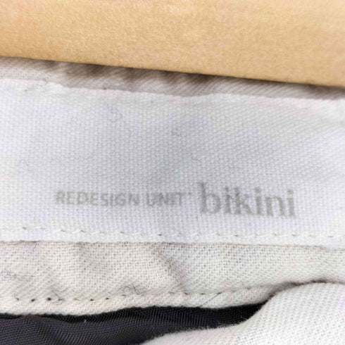 REDESIGN UNIT BIKINI アシンメトリーフロント ウールタックパンツ レディース