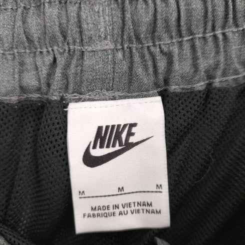 ナイキ NIKE オーバーサイズド ミッドライズ ウーブン パンツ レディース JPN:M