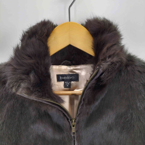 bebe レザー切り替え ファー ジップアップジャケット レディース import:M