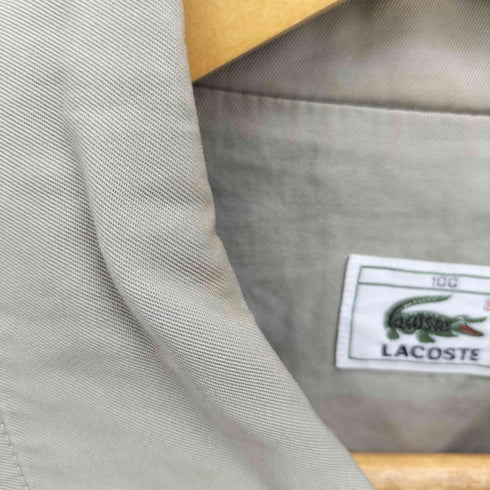 ラコステ LACOSTE ワンポイント ロゴプレート スイングトップ メンズ 100