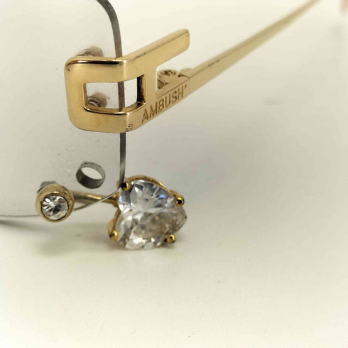 アンブッシュ AMBUSH PIERCED リムレス メガネ メンズ 61□20-140