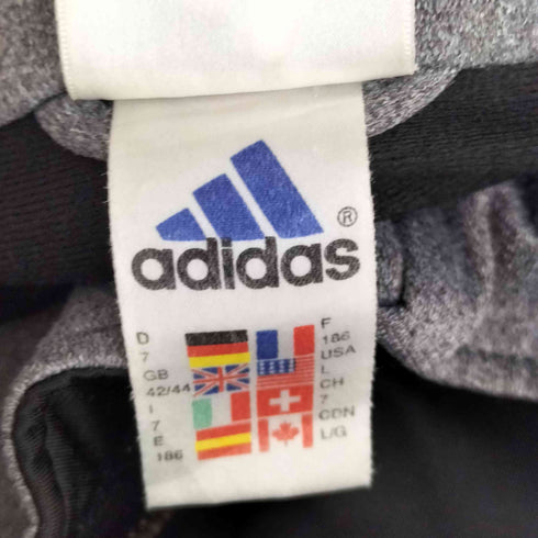 アディダス adidas 90s~00s 万国旗タグ 両面パフォーマンスロゴ刺繍 袖切替 トラックジャケット 裾ドローコード メンズ import:L