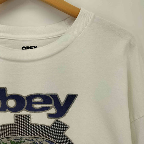 オベイ OBEY PEACE & UNITY プリントクルーネックTシャツ メンズ JPN:L