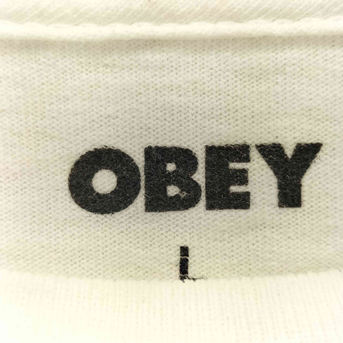 オベイ OBEY PEACE & UNITY プリントクルーネックTシャツ メンズ JPN:L