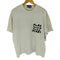 ブラックコムデギャルソン BLACK COMME des GARCONS Oversize Side Message Print Tee メンズ JPN:S