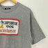 エフエーエフ/フェイクアズフラワーズ FAF/Fake As Flowers COOPERATIVE MININGプリント クルーネックTシャツ メンズ import:S