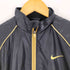ナイキ NIKE ウィンドブレーカージャケット レディース M