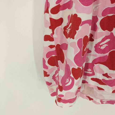 アベイシングエイプ A BATHING APE Keith Haring キースへリング ピンクカモ 総柄 Tシャツ メンズ JPN:L